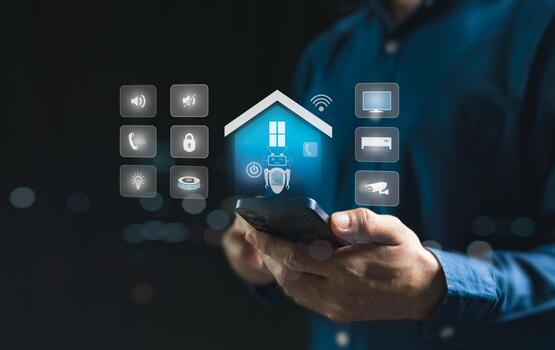 Smart home concept, remote control via mobile phone, Wi-Fi via AI assistant robot to control appliances and protect all systems that are connected within the home intelligently. Man using mobile phone photo