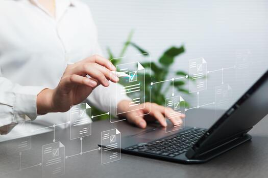 Approval of electronic documents on a virtual screen, online via laptop, document management concept, submit project reviews with highly secure data files, connection to efficient paperless systems. photo