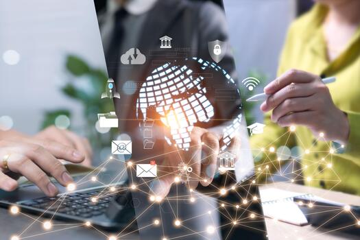 The concept of borderless communication, secure connection via the internet, can be used for business discussions or contacting investors and banks efficiently, meeting and talking via laptop devices. photo