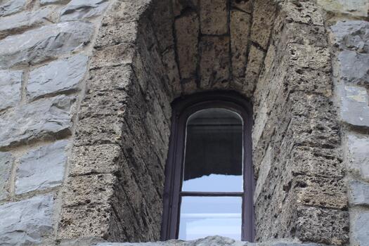 A window in a stone building photo