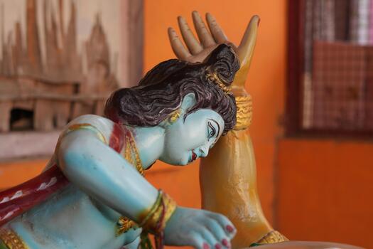 Lord Krishna statue close-up face expression photo