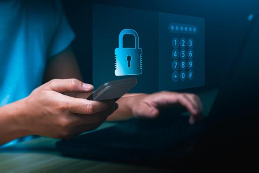 Cybersecurity concept with user holding smartphone, laptop showing digital lock and password keypad, data protection, privacy access control, secure authentication, online safety, information security photo