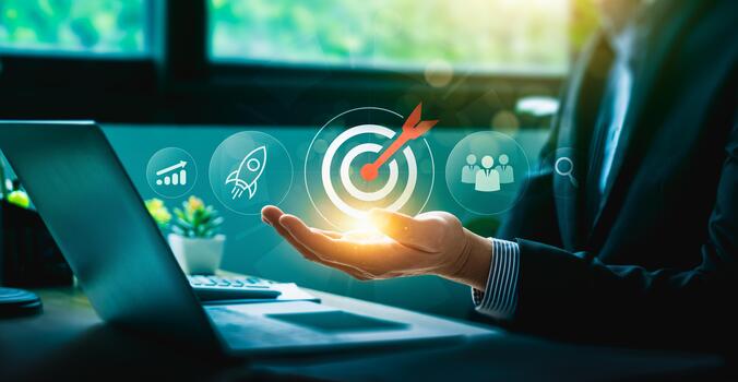 Business target achievement and strategy concept with businessman holding digital dartboard icon surrounded by growth chart, rocket launch, teamwork, and search innovation for success and performance photo