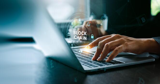 Blockchain technology concept with hand typing on laptop, secure decentralized digital ledger system for cryptocurrency, Bitcoin transaction, fintech innovation, financial security, data transparency photo