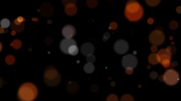 Abstract blurry bokeh background with lights particles on dark background. Alpha channel Transparent video