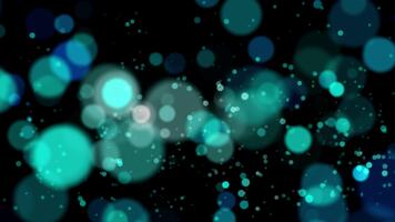 Abstract blue tones bokeh background with lights particles on dark background. Alpha channel Transparent video