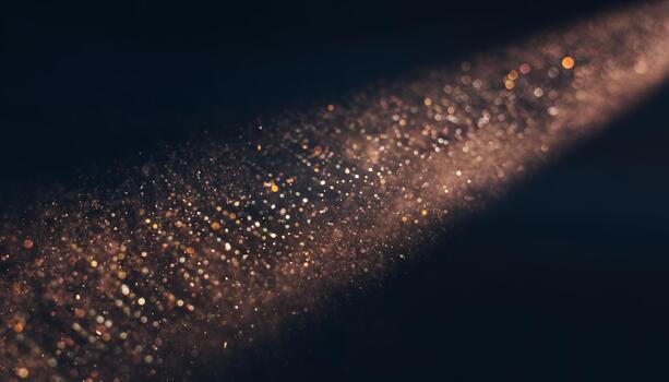 Abstract Glittering Gold Particles on Dark Background for Luxury and Celebration Themes photo