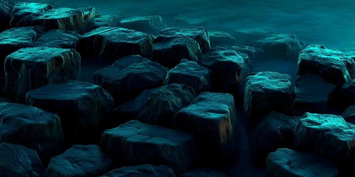 Numerous dark rectangular rocks are illuminated by vibrant teal light creating a mysterious abstract underwater landscape photo