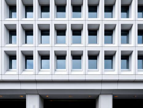 Modern architecture featuring grid design and windows in urban setting photo