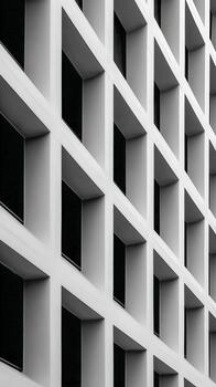 Modern architectural design featuring contrasting light and shadow patterns photo