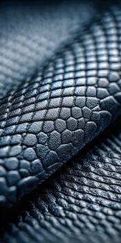 Textured blue leather with unique reptile-like patterns and shine photo