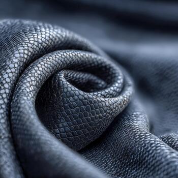 Textured black fabric in a close-up view showcasing its intricate design photo
