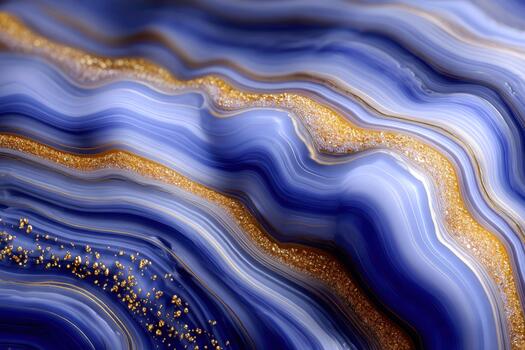 Vibrant blue and gold agate with flowing patterns and textures photo