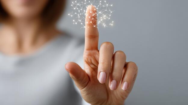 A young woman of mixed ethnicity gently touches a glowing digital interface, symbolizing technology and innovation. photo