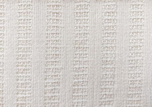 Light Colored Fabric with Vertical Loop Pattern Decorative Textile with Grid-Like Stitch Detail photo