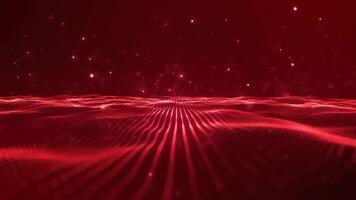 Abstract red flowing particles form a digital landscape with shimmering lights in the background video
