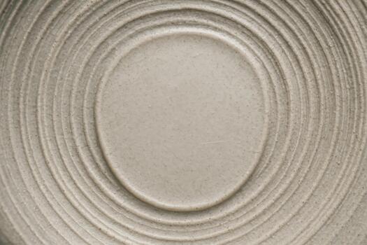 Circular patterns in textured pottery showcasing artisan craftsmanship from a local studio photo