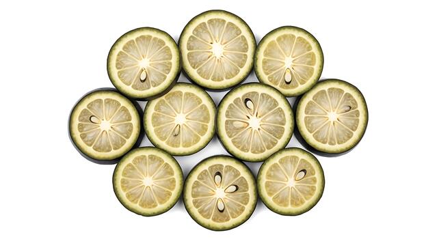Fresh Lime Slices Arranged in Pattern on White Background, Top View photo