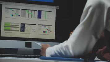 A person is working on a computer screen with a chart on it video