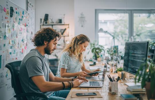 Tech Startup Co Founders Working Together in Modern Office photo