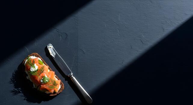 Delicious Smoked Salmon Toast with Cream Cheese and Dill on Dark Background photo