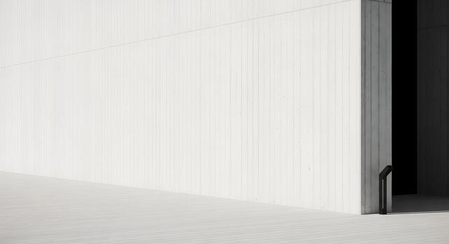 Minimalist architecture featuring clean lines contrasting shadows and light creating abstract architectural background photo