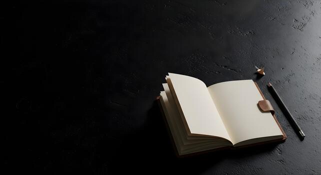 Open notebook with blank pages and a pencil on dark background for writing and creativity photo