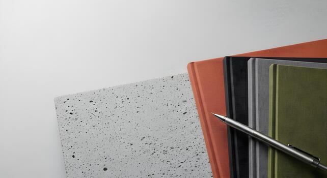 Notebooks and Writing Utensil Composition Showing a Clean and Organized Workspace for Productivity photo