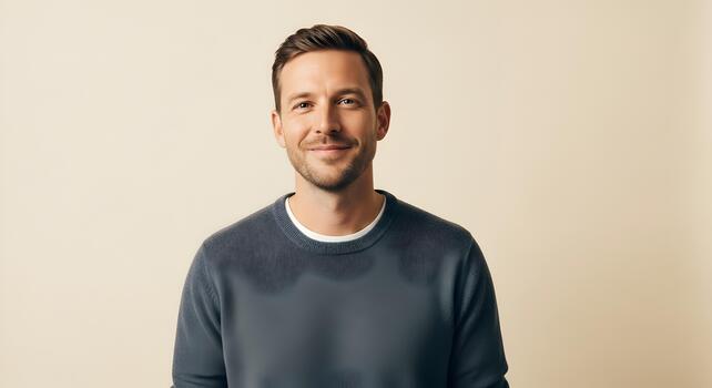 Portrait of a Young Professional Man Smiling Confidently Against a Neutral Background for Business Purposes photo