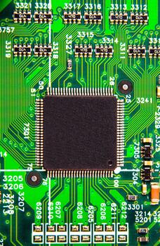 A electronic board with digital chip or microcircuit vertical orientation photo