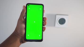 Setting up smart thermostat with mobile device video