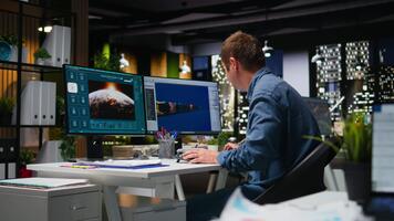 Expert works with AI game hub and turbine to develop futuristic Mars station. Neural networks powered software uses automation and deep learning to generate game environments and tools. Camera A. video