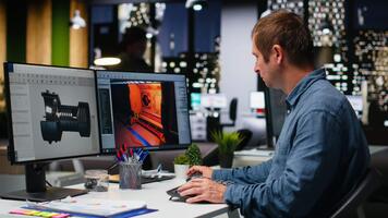 IT engineer checks AI game lobby and turbine to develop a new application, futuristic spaceship game. Neural network powered software uses machine learning to generate game tools. Camera B. video