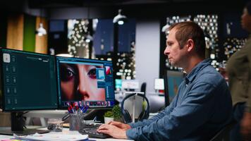 Male graphic designer using AI powered content for image retouching, working on contrast adjustments. Photographer employs futuristic interface for his portfolio, artificial intelligence. Camera B. video