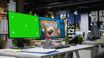 Green screen and architectural software on dual monitors at the workstation, efficient decoration and layout planning for new apartment building. 3D rendering and CAD interface. video