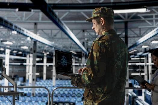 Military data command center officer coordinating tactical decisions using AI driven surveillance intelligence. Army expert managing threat detection software enhanced by machine learning algorithms photo