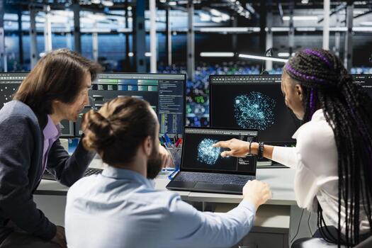 Data center coworkers doing brainstorming, monitoring AI applications, adjusting machine learning. Server hub colleagues working together, enhancing artificial intelligence software performance photo