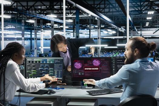 Team leader and software developers in server hub use deep learning to fix hacking incident. Data center colleagues use artificial intelligence tech to stop exploits breaching security systems photo