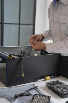 Computer Hardware technician dissemble and fixing computer PC. photo