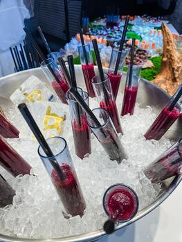 festive and lively beverage display area, colorful handles of summer drinks for joyful gatherings, vibrant assortment of summer refreshments creating joyful and energetic social environments photo