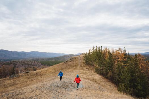Hikers ascend treacherous peaks under overcast autumn skies confidently, Climbers and hikers demonstrate unwavering resolve while navigating challenging mountain terrain amidst cloudy fall photo