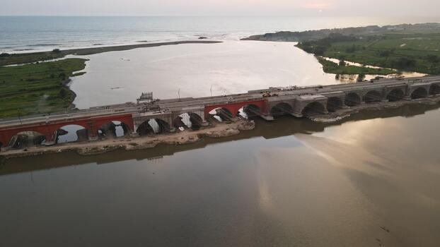 Aerial view of the construction of the Pandansimo Bridge, which connects the southern Java route, in Bantul, Yogyakarta, Indonesia. photo