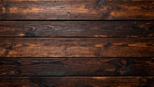 Horizontal arrangement of dark, rich brown wooden planks creates a rustic background texture. photo