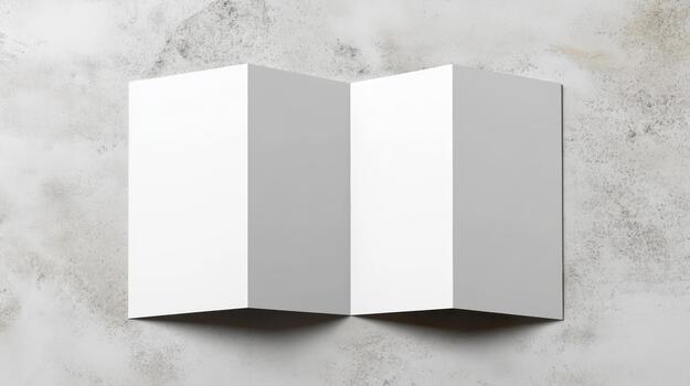 Two white paper folding boxes on a concrete wall photo