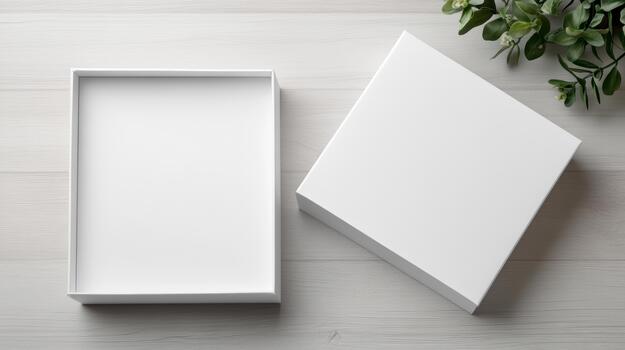 Two empty white boxes on a wooden table photo