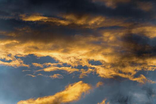 Beautiful view natural meteorology abstract background. Fluffy clouds illuminated by disappearing rays at sunset, thunderclouds floating across sky photo