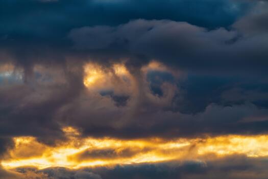 Impressive clouds in sky illuminated by rays of sun at sunset to change weather. Multicolored cloudscape abstract meteorology background photo