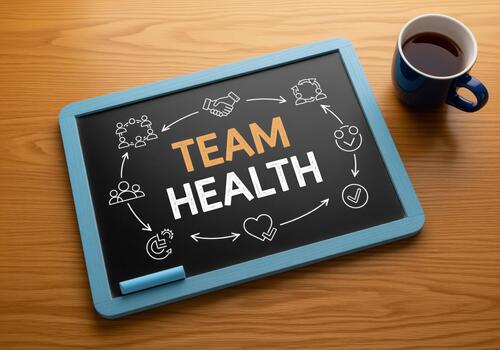 Visualizing team health concept on chalkboard with icons for business success photo