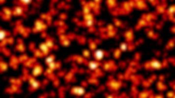 lysande orange bokeh partiklar flytande abstrakt rörelse bakgrund för dynamisk värma ljus klot drivande mjukt, idealisk för överlägg, övergångar, eller omgivande bakgrunder i redigering video