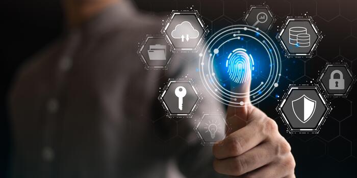 A user authenticates with a digital fingerprint scanner surrounded by cybersecurity icons, illustrating data protection, secure access, encryption, cloud security, advanced identity verification photo
